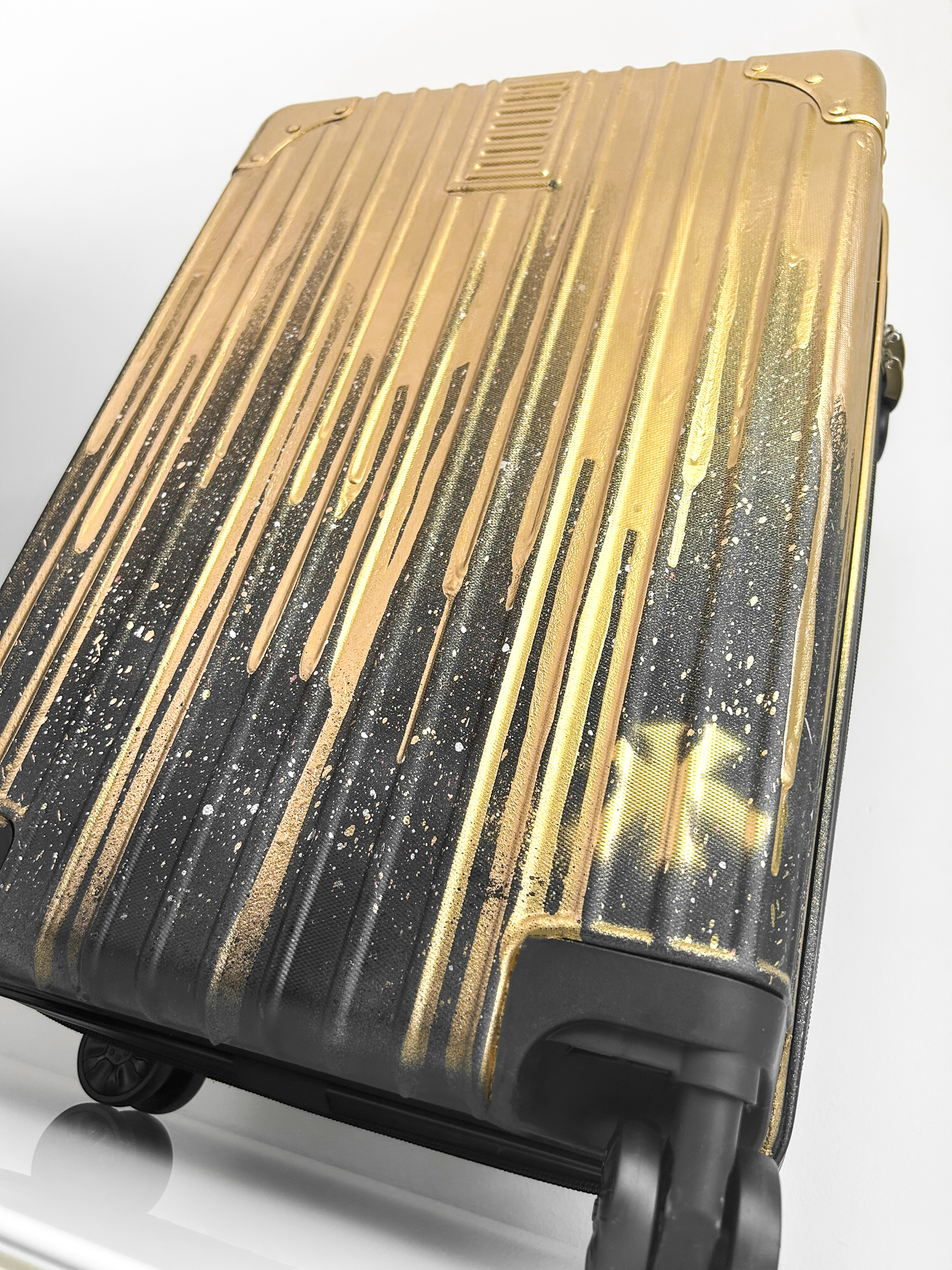 GOLDEN DRIPPY SUITCASE